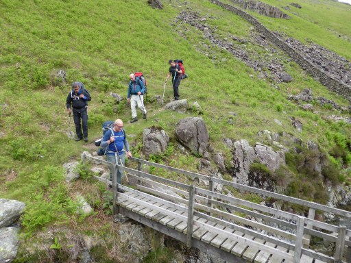 Crossing Over Beck, just below Dropping Crag on Yewbarrow.  Adrian leading the way.