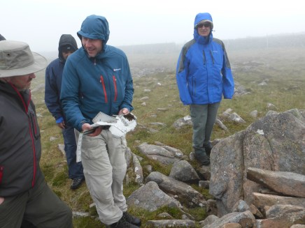 Steve examining the remains of the RCAF Sabre on the top of Iron Crag