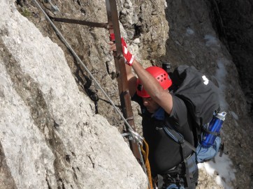 Nas, in a typical heroic stance, complete with Batman cloak.